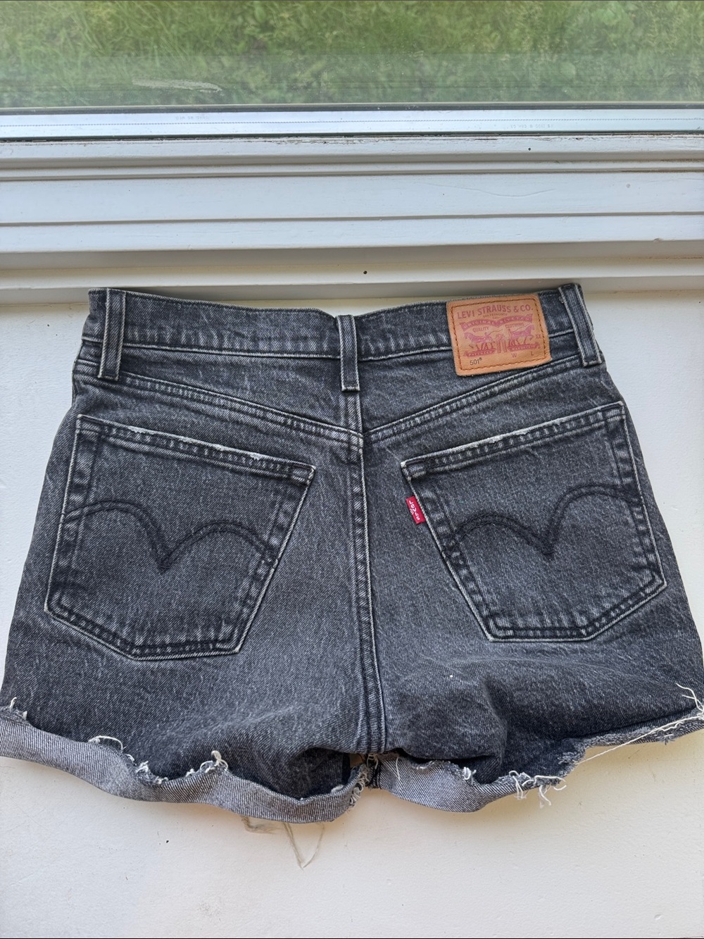 Levi's Women's Washed Black Denim Cutoff Shorts